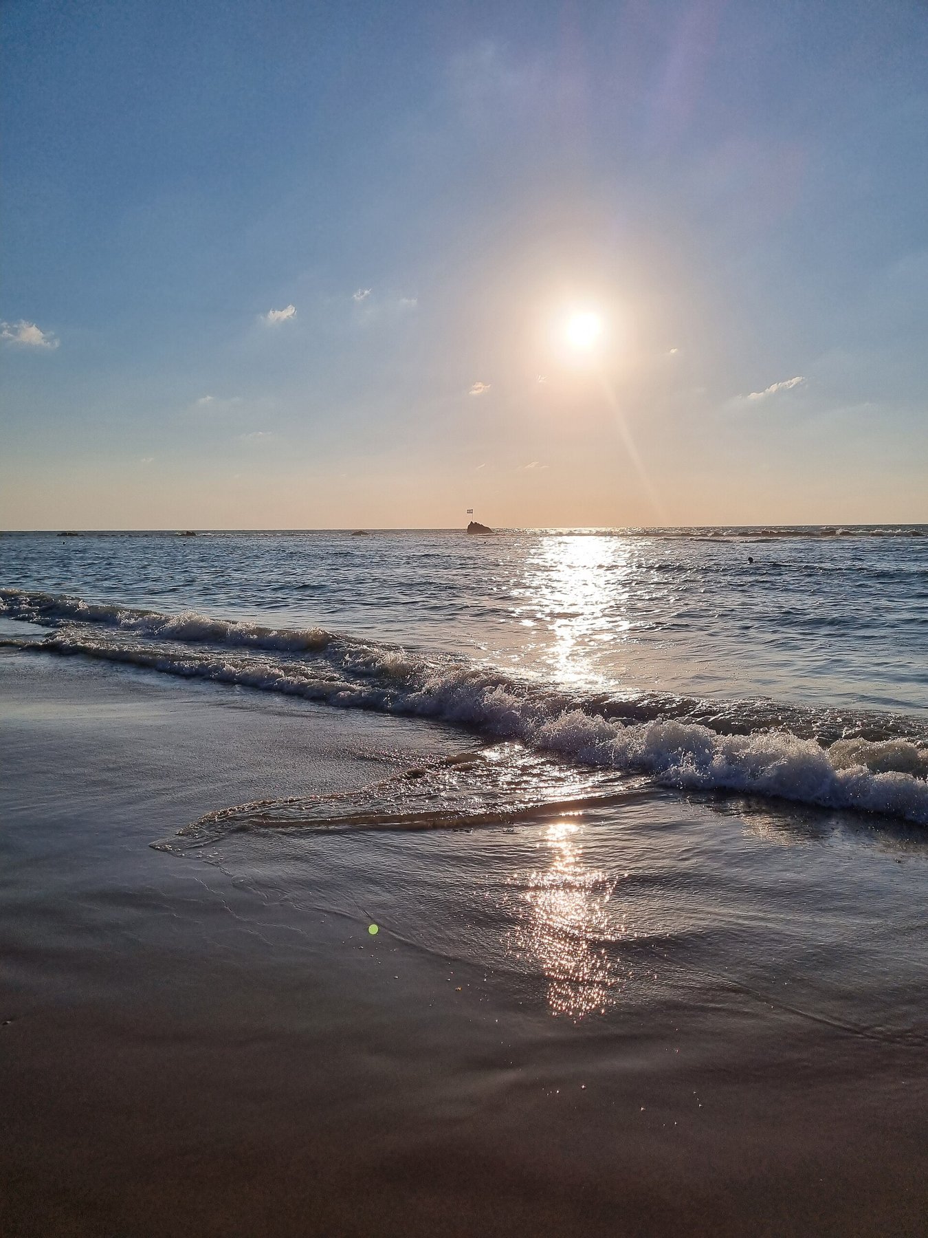 Bright sunlight reflected from a water surface.